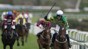 <p>WHIP HAND: Paul Townend savours the moment after riding I Am Maximus to victory in last year's  Grand National at Aintree. 	Picture: Alan Crowhurst/Getty </p>