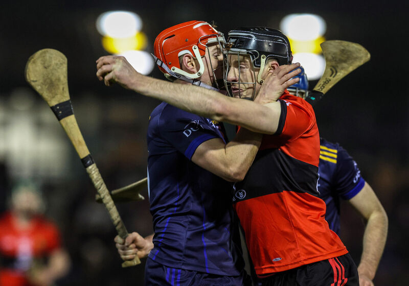 UCC’s Eoin Downey and Sam Bourke of DCU. Pic Credit: ©INPHO/Lorraine O’Sullivan
