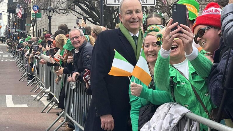 Taoiseach Micheál Martin chatting with revellers at the New York City St Patrick's Day Parade in 2023.