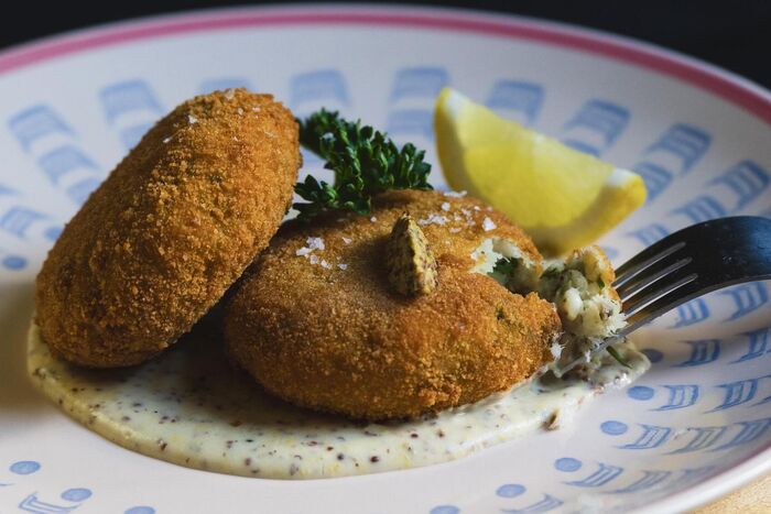 Fish cakes with mustard sauce
