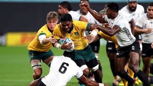 Australia survive scare to make winning World Cup start against Fiji