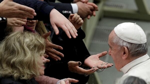 Pope Francis is greeted by some of the faithful during the weekly general audience at the Vatican today. Pic: AP Pope Francis is greeted by some of the faithful during the weekly general audience at the Vatican today. Pic: AP