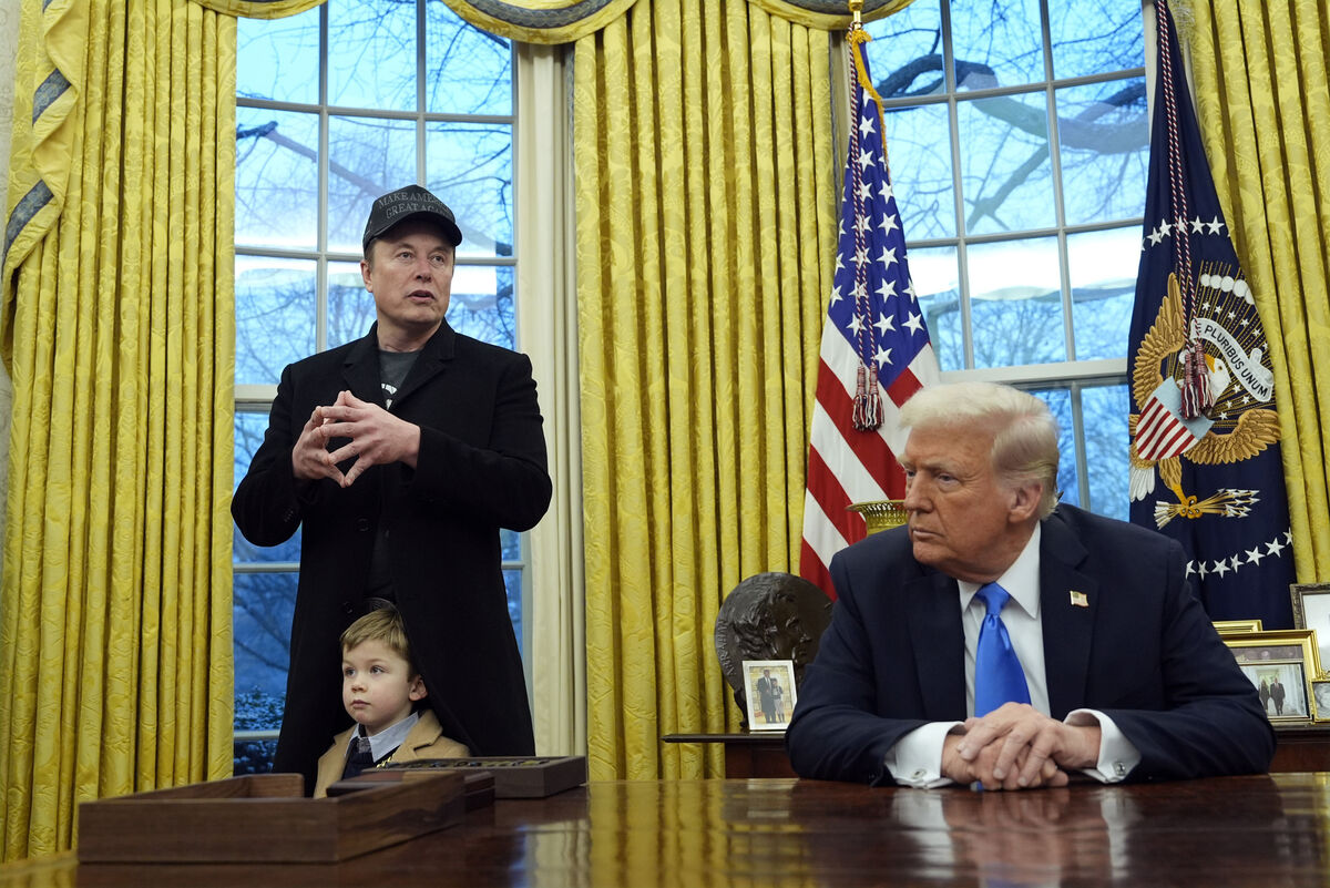 President Donald Trump listens as Elon Musk, joined by his son X Æ A-Xii, speaks in the Oval Office at the White House, Tuesday, Feb. 11, 2025, in Washington. (Photo/Alex Brandon)