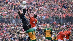 <p>RISING HIGH: Donegal goalkeeper Shaun Patton, supported by team-mate Ryan McHugh, in action against Peter McGrane of Armagh during last yera's Ulster final at St Tiernach's Park in Clones. Pic: Piaras Ó Mídheach, Sportsfile</p>