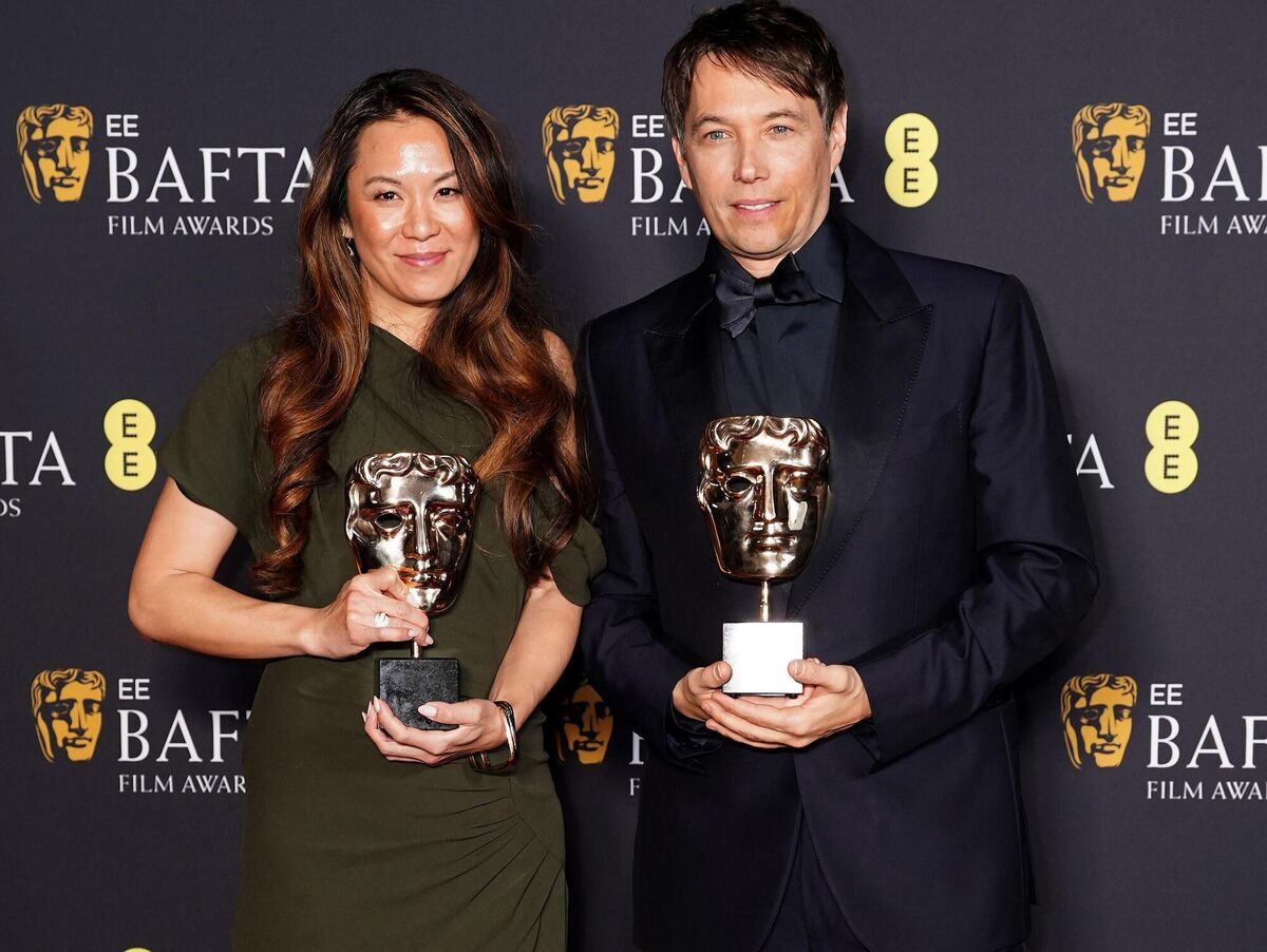 Sean Baker and Samantha Quan in the press room after winning the Best Casting award for Anora during the 78th British Academy Film Awards, at the Royal Festival Hall, Southbank Centre, London. Picture date: Sunday February 16, 2025. PA Photo. See PA story SHOWBIZ Bafta. Photo credit should read: Ian West/PA Wire.