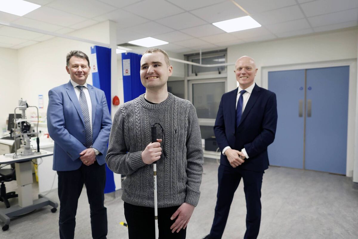 'Professor Keegan... pulled out a large letter card and covered one of my eyes. I was able to see that it was a large letter T.' Stuart Haxell with consultant ophthalmic surgeon Prof David Keegan and Fighting Blindness CEO Finbarr Roche at the Mater Hospital. Picture: Julien Behal