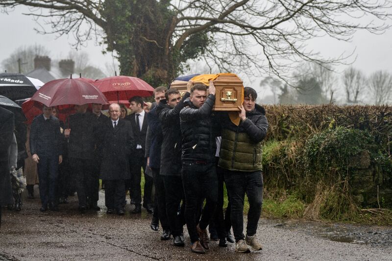 Friends and family carry the coffin of Michael O'Sullivan’s during his funeral procession in Lombardstown, Co Cork. Picture: Chani Anderson Friends and family carry the coffin of Michael O'Sullivan’s during his funeral procession in Lombardstown, Co Cork. Picture: Chani Anderson