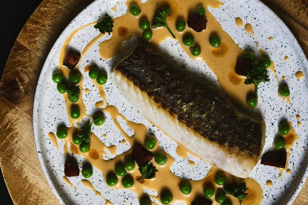 Hake with a creamy chorizo sauce