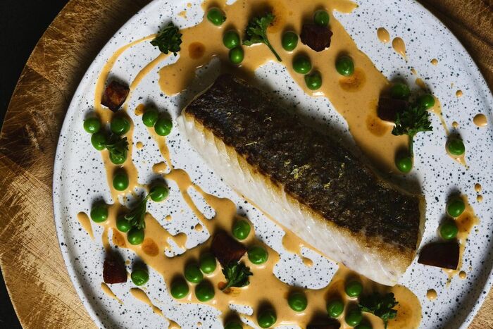 Hake with a creamy chorizo sauce