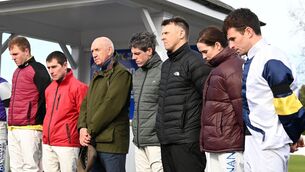 <p>RESPECT: Jockeys observe a minute's silence at Punchestown on Thursday in memory of Michael O'Sullivan (Healy Racing)</p>