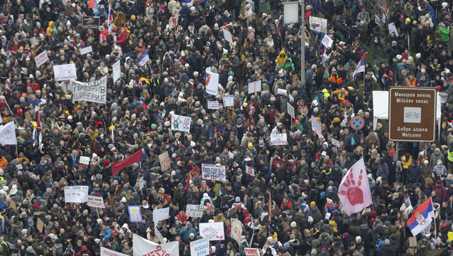People attend a protest triggered after a concrete canopy on a railway station in the northern city of Novi Sad, Serbia (Marko Drobnjakovic/AP)