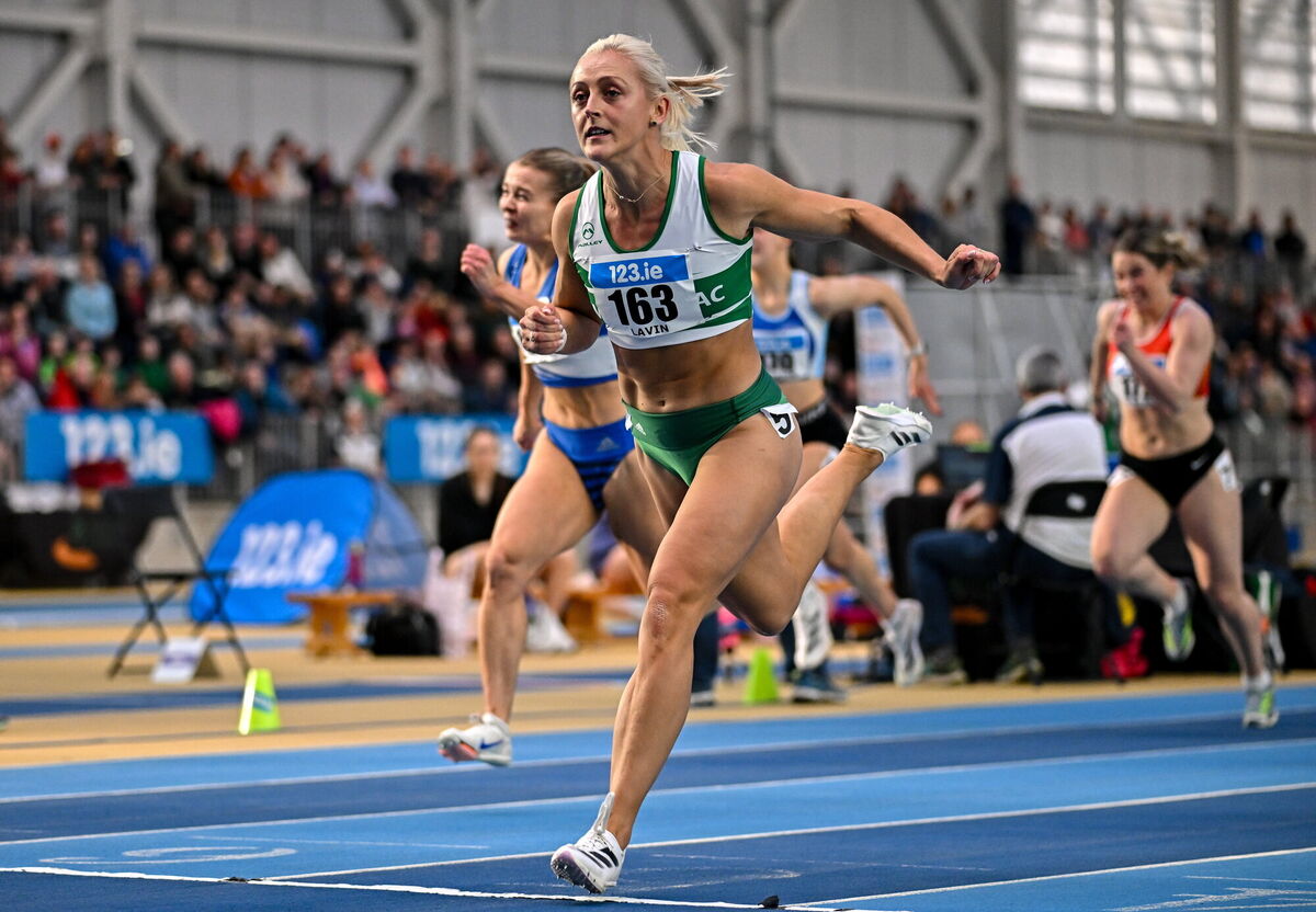 Sarah Lavin of Emerald AC, Limerick, crosses the finish line to win the women's 60m hurdles final. Pic: Sam Barnes/Sportsfile.