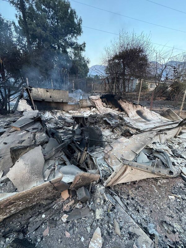 Andrew and Renata were left devastated when their house and adjoining business burned to the ground. Andrew and Renata were left devastated when their house and adjoining business burned to the ground.