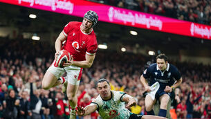 <p>Wales' Tom Rogers scores their second try during the Guinness Men's Six Nations match at the Principality Stadium. Pic: Joe Giddens/PA Wire.</p>