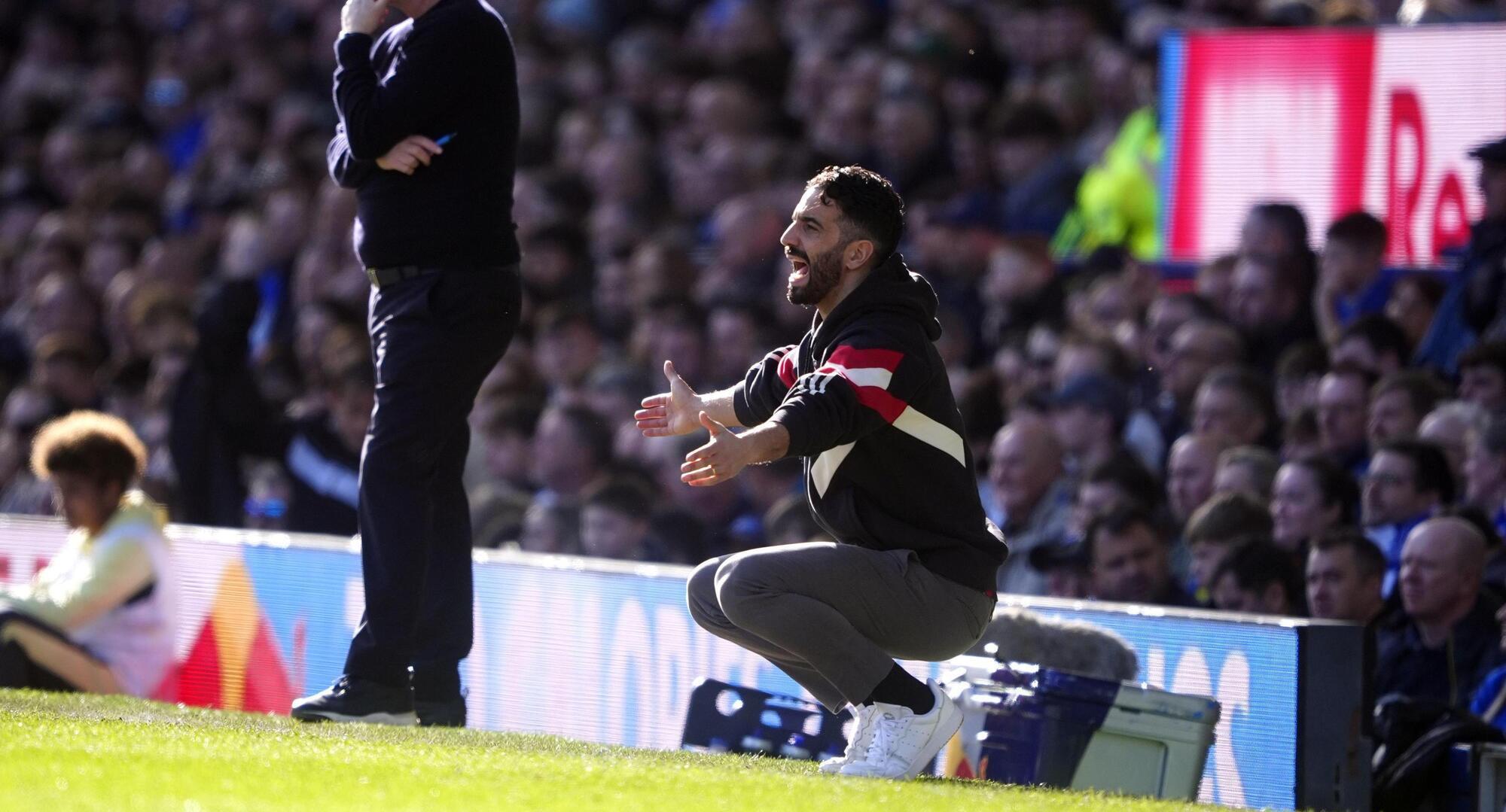 ON THEIR KNEES: Manchester United manager Ruben Amorim during the Premier League match at Goodison Park, Liverpool. Pic: Peter Byrne/PA Wire.