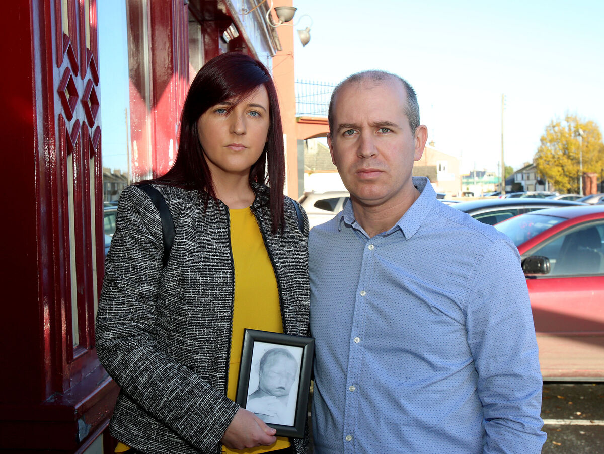 Warren and Lorraine Reilly from Loughrea, Co Galway, with a photograph of their daughter, Asha, who was stillborn at Portiuncula University Hospital in 2008. Picture: Hany Marzouk