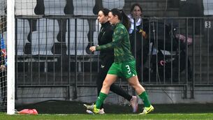 <p>INJURY BLOW: Megan Campbell leaves the pitch with Republic of Ireland physiotherapist Angela Kenneally before the UEFA Women's Nations League B match between Slovenia and Republic of Ireland at Bonifika Stadium in Koper, Slovenia. Photo by Stephen McCarthy/Sportsfile</p>