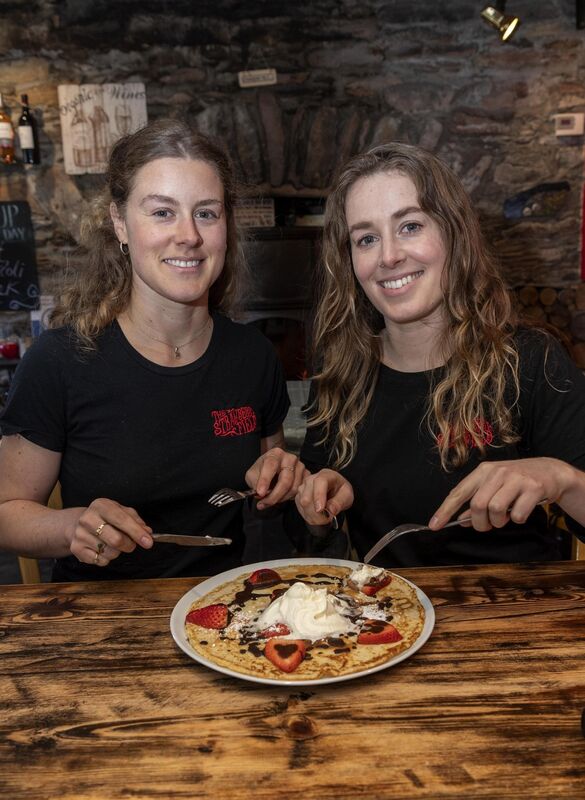 Mayra, left and Yosta Kerssens enjoy one of their strawberry pancakes at The Strawberry Field Pancake Cottage &amp; Craft Shop on the Ring of Kerry between Sneem and Killarney. Photo: Don MacMonagle