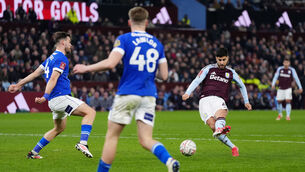 <p>Aston Villa's Marco Asensio scores their opener in the FA Cup fifth round against Cardiff at Villa Park on Friday night: Bradley Collyer/PA</p>