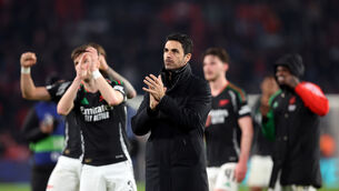 Mikel Arteta and his players applaud the Arsenal fans after hammering PSV Eindhoven (Peter Lous/PA)
