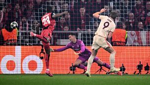 <p>HEADS UP: Munich's Harry Kane, right, scores the opening goal during the Champions League round of 16 first leg soccer match between FC Bayern Munich and Bayer 04 Leverkusen in Munich, Germany, Wednesday, March 5, 2025. Pic: Tom Weller/dpa via AP)</p>