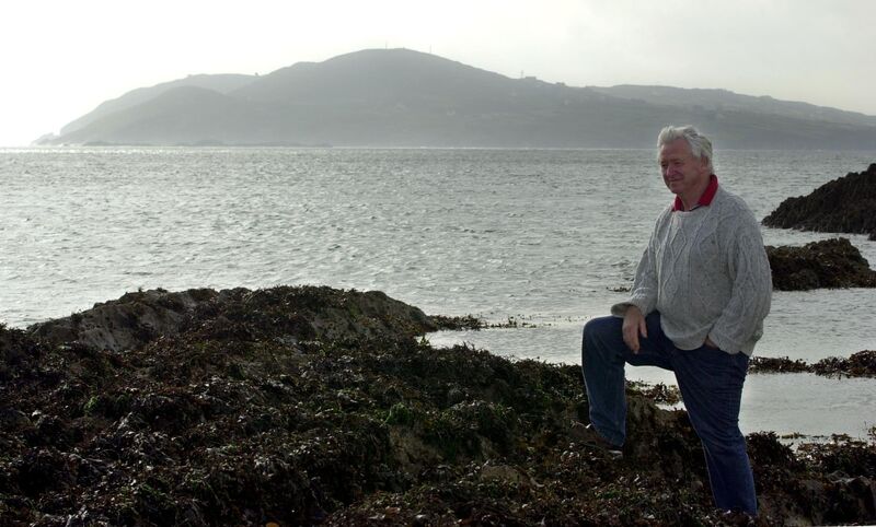 Matt Murphy, director, Sherkin Island Marine Station standing on the rocky shore at the western end of the island against the backdrop of Oilean Chleire off the West Cork coast. File picture: Denis Minihane.