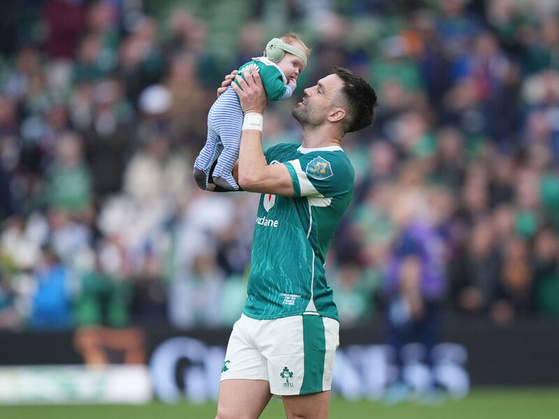 ONE LAST TIME: Ireland's Conor Murray reacts with his child following the Six Nations match the Aviva Stadium. Pic: Niall Carson/PA Wire. ONE LAST TIME: Ireland's Conor Murray reacts with his child following the Six Nations match the Aviva Stadium. Pic: Niall Carson/PA Wire.