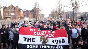 <p>Manchester United fan group The 1958 protest against the club’s ownership ahead of the Premier League match against Arsenal (Martin Rickett/PA)</p>