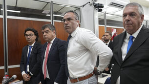 Neurologist Leopoldo Luque stands in court on the first day of the trial in Buenos Aires, Argentina (Natacha Pisarenko/AP)