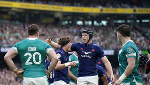 <p>France's Oscar Jegou celebrates scoring their side's fourth try of the game. Pic: Niall Carson/PA Wire.</p>