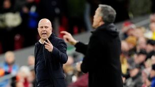 <p>TWO TO TANGO: Liverpool manager Arne Slot (left) gestures on the touchline as Paris Saint-Germain head coach Luis Enrique watches on during the UEFA Champions League round of sixteen second leg match at Anfield, Liverpool. Pic: Martin Rickett/PA Wire</p>
