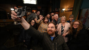<p>Bernard O’Shea on the Ros na Rún TV set with cast and crew. Pictures: Ray Ryan</p>