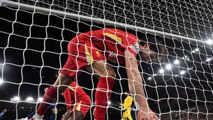 <p>Liverpool midfielder Dominik Szoboszlai reacts after the goal scored by Paris Saint-Germain's French forward Ousmane Dembele during the last 16 second leg tie. Photo:OLI SCARFF/AFP via Getty Images</p>