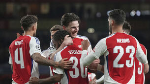<p>Arsenal's Declan Rice, centre, celebrates with teammates after scoring his side's second goal against PSV. Pic: AP Photo/Alastair Grant</p>