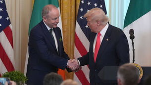 <p>Taoiseach Micheal Martin and US President Donald Trump during the St Patrick's Day Reception and Shamrock Ceremony in the the East Room of the White House, in Washington DC, as part of his week long visit to the US. Picture: Niall Carson/PA Wire</p>