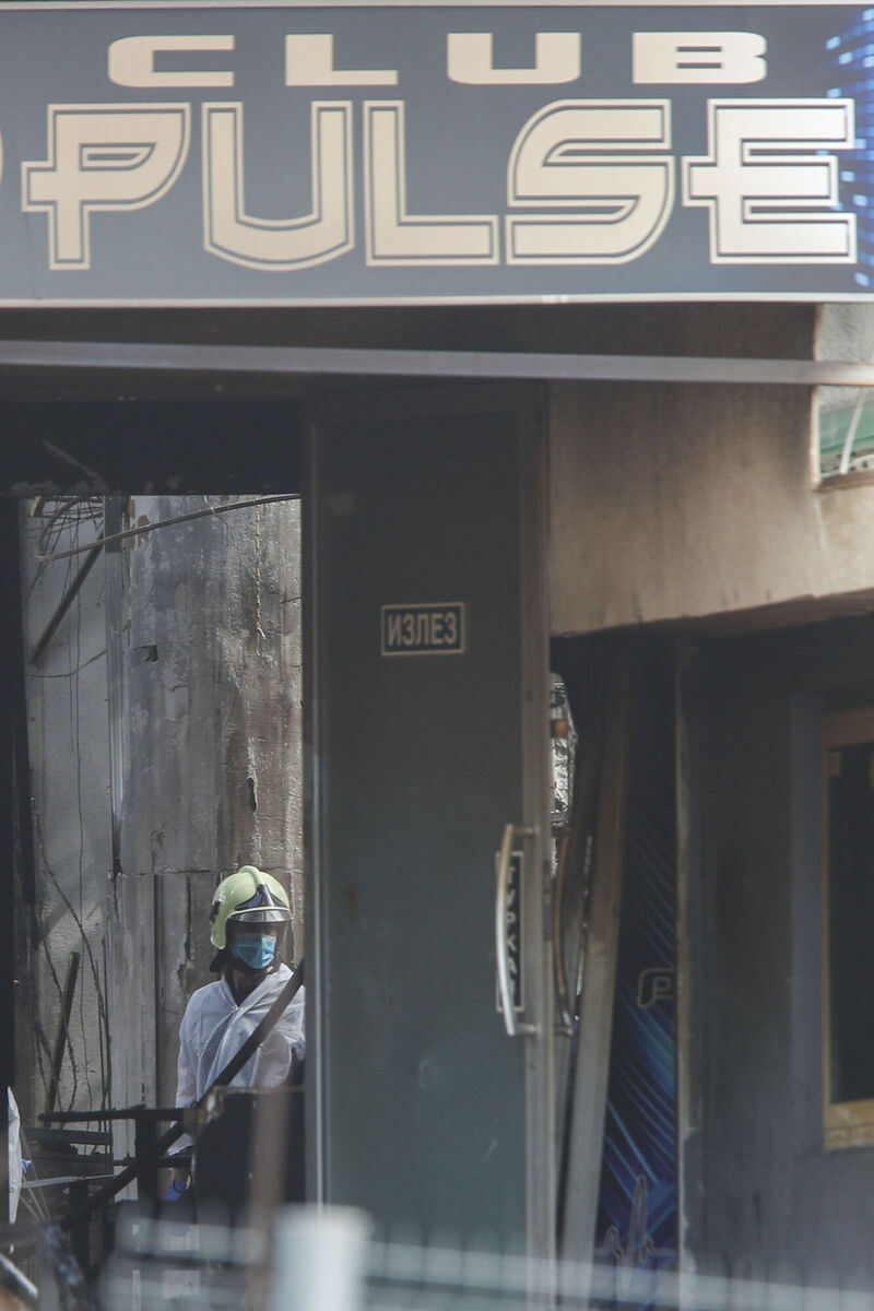 A firefighter inspects a nightclub after a massive fire in the town of Kocani, North Macedonia, Sunday, March 16, 2025. Picture: AP Photo/Boris Grdanoski