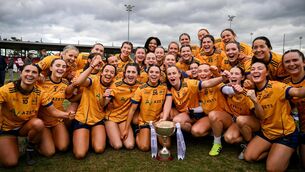 <p>DCU Dóchas Éireann players celebrate with the O'Connor Cup after the 2025 Ladies AIG O’Connor Cup final match between DCU Dóchas Éireann and UCC at Queen's Sport, Queens University, Belfast. Photo by Ben McShane/Sportsfile</p>
