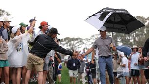 <p>PLAY SUSPENDED: Rory McIlroy leads the Players Championship by one shot as play is suspended due to a storm. Pic: Richard Heathcote/Getty Images</p>