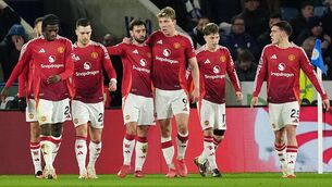 <p>FINALLY: Manchester United's Rasmus Hojlund celebrates with team-mates. Pic: Martin Rickett/PA Wire.</p>