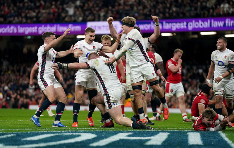 RUNNING RIOT: England players celebrate after Joe Heyes (centre) scores their side's eighth try during the Guinness Men's Six Nations match at the Principality Stadium, Cardiff. Picture: Joe Giddens/PA Wire 