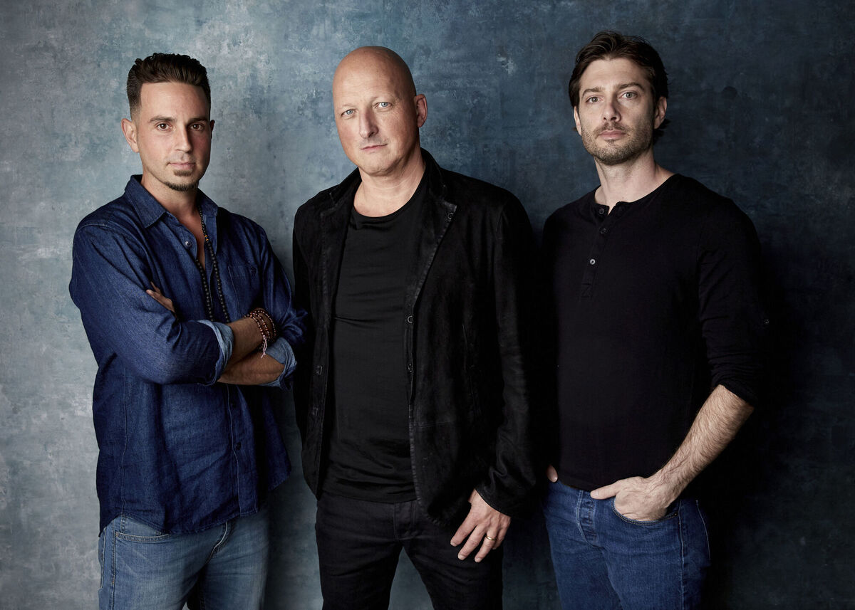 Wade Robson, director Dan Reed, and James Safechuck. Picture: Taylor Jewell/Invision/AP, File