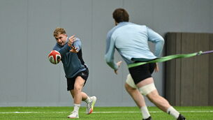 <p>RETURN NEAR: Craig Casey passes to Ryan Baird during an Ireland Rugby squad training session at the IRFU High Performance Centre. Pic: Brendan Moran/Sportsfile</p>
