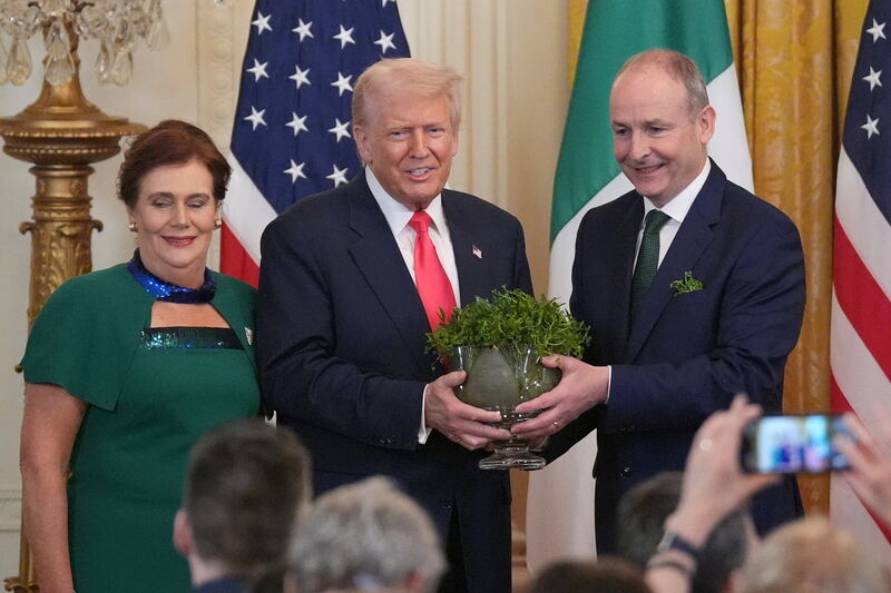 Taoiseach Micheál Martin and his wife Mary O'Shea with US president Donald Trump during the St Patrick's Day reception and shamrock ceremony in the the East Room of the White House last week.