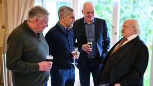 <p>President of Ireland Michael D Higgins with, from left, Kevin Sheedy, Chris Hughton and David Kelly of the Republic of Ireland squad from the Italia 1990 FIFA World Cup at Áras an Uachtaráin. Pic: Stephen McCarthy/Sportsfile</p>