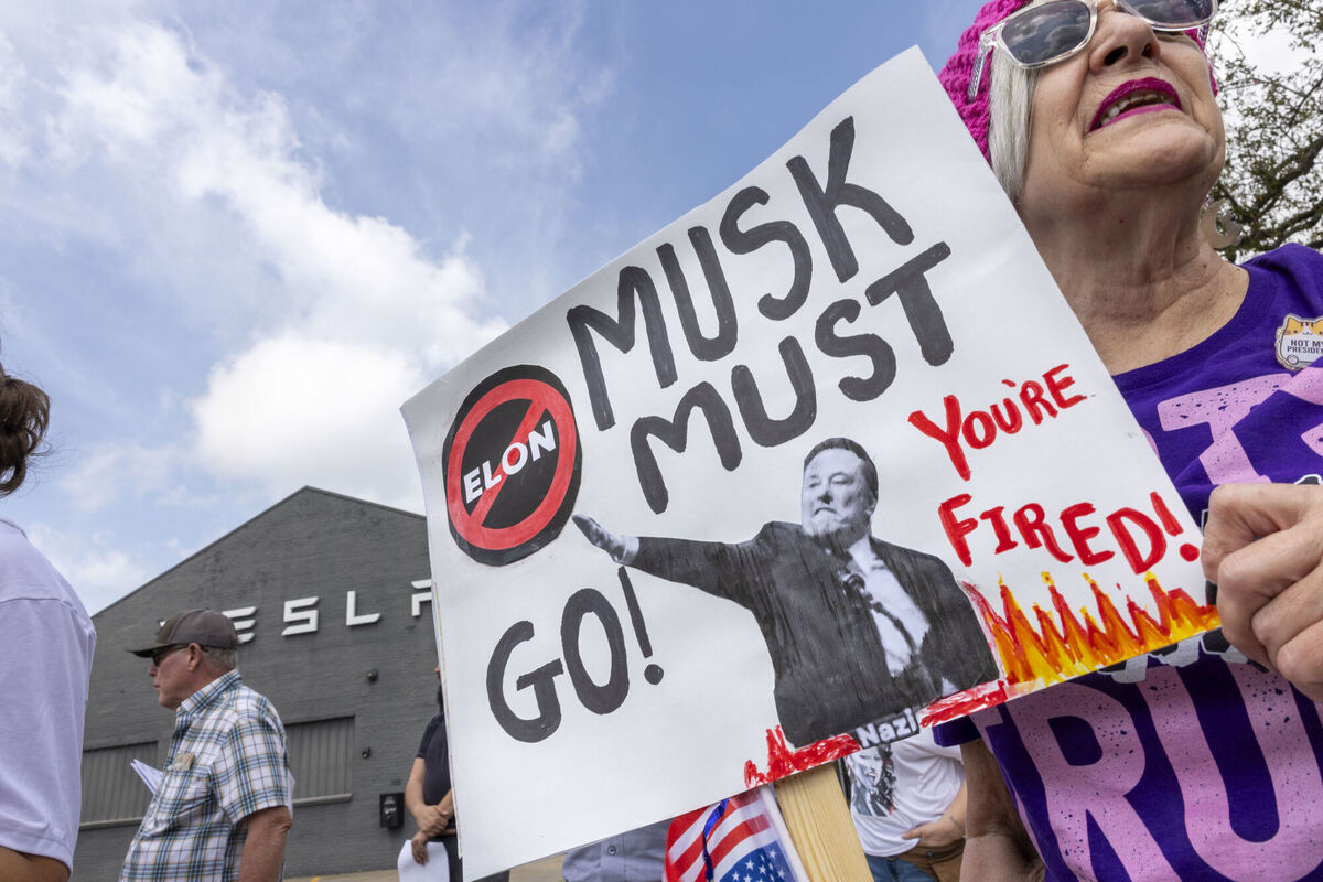 Protesters outside a Tesla Service Center on Tchoupitoulas Street in New Orleans express their issues with Elon Musk and US president Donald Trump on Friday, March 14, 2025. (Chris Granger/The Times-Picayune/The New Orleans Advocate via AP) Protesters outside a Tesla Service Center on Tchoupitoulas Street in New Orleans express their issues with Elon Musk and US president Donald Trump on Friday, March 14, 2025. (Chris Granger/The Times-Picayune/The New Orleans Advocate via AP)