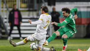 <p>Ireland's Troy Parrott shoots under pressure from Lukas Petkov of Bulgaria. Pic: Kostadin Andonov, Inpho</p>