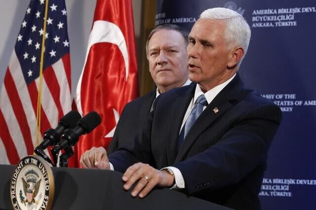 US vice president Mike Pence and secretary of state Mike Pompeo hold a news conference in Ankara, Turkey (AP/Jacquelyn Martin)