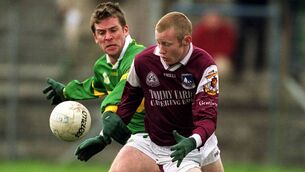 <p>Michael Comer of Galway in action against Dara Ó Cinnéide of Kerry at Tuam Stadium in 2001. Defeat that day consigned Kerry to relegation from Division 1. Pic: Brendan Moran/Sportsfile</p>
