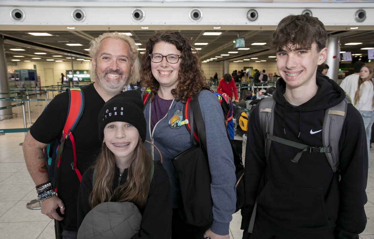 Kelly and Chris Walton with their children Charlotte and Lennon were on their way from Toronto to Lisbon with a long stop in Heathrow when their flight was diverted to Shannon. Picture: Gareth Chaney