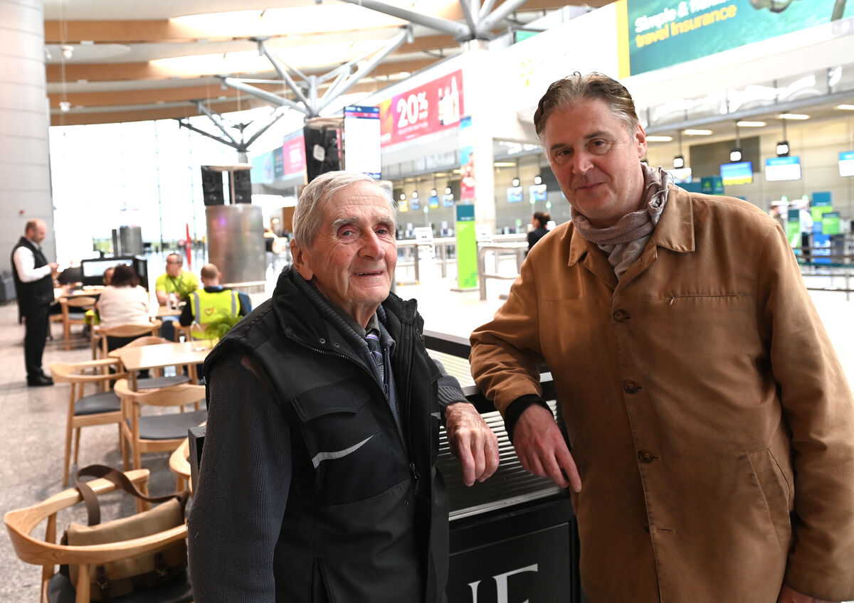  Patrick Hartnett, Bishopstown with his son Declan whose flight to London was cancelled due to the closure of Londow Heathrow Airport on Friday morning. Picture: Larry Cummins